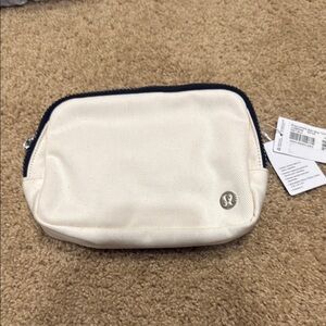 Lululemon Athletica Cream Crossbody Bag with Elegant Simplicity